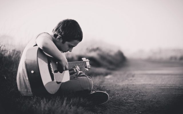 child-guitar-playing